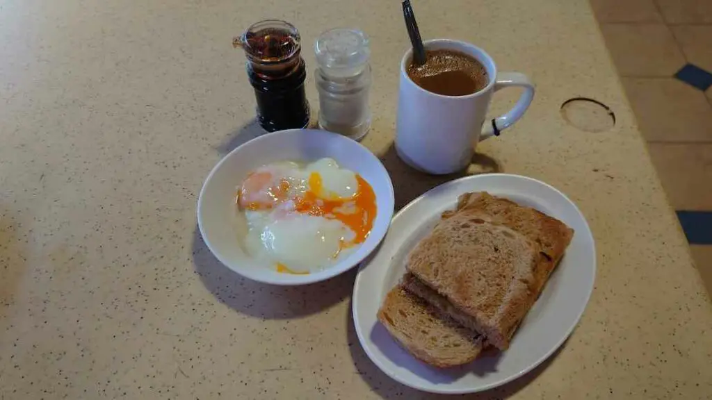 Morning breakfast egg with kaya toast