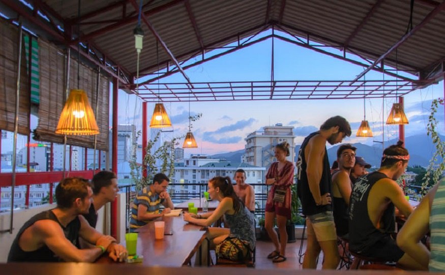 Tourists lounging at a hostel in Vietnam