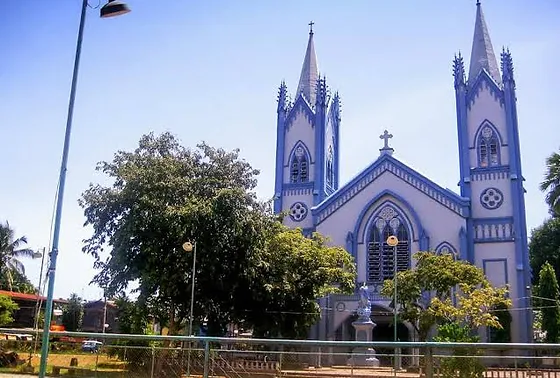 The blue-white exterior of Immaculate Conception Cathedral