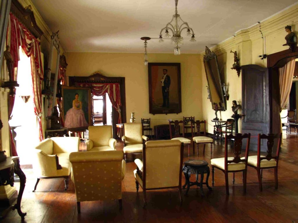 The Spanish-style living room in Syquia Mansion