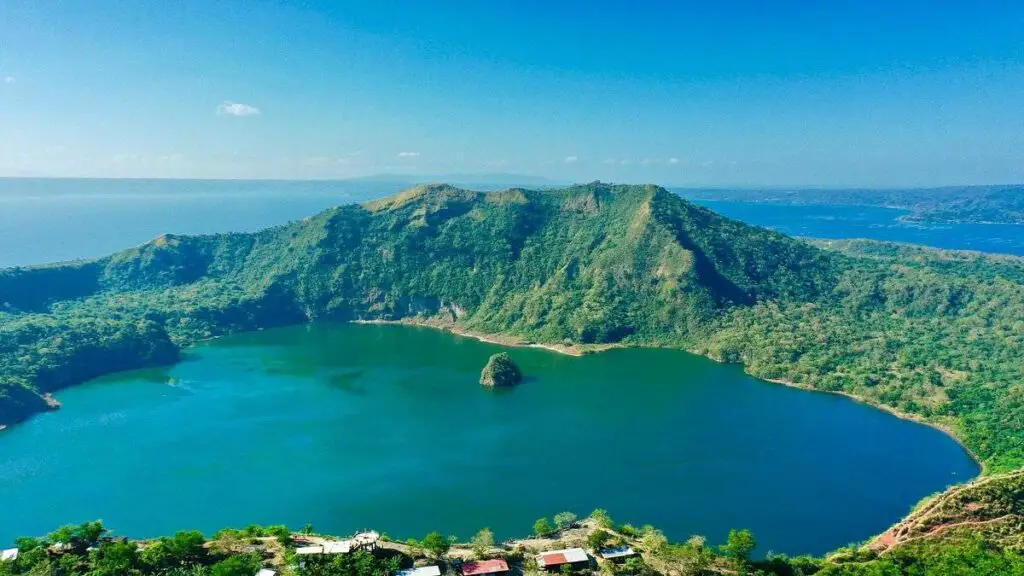 The Taal Volcano's crater with a lake and an island inside of it