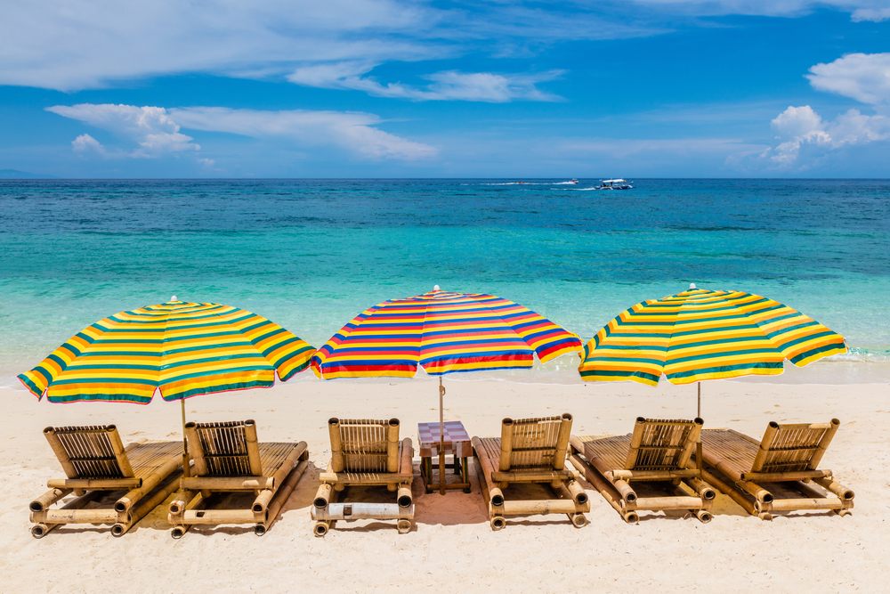 Cute and colorful bamboo lounges at Ilig-iligan Beach