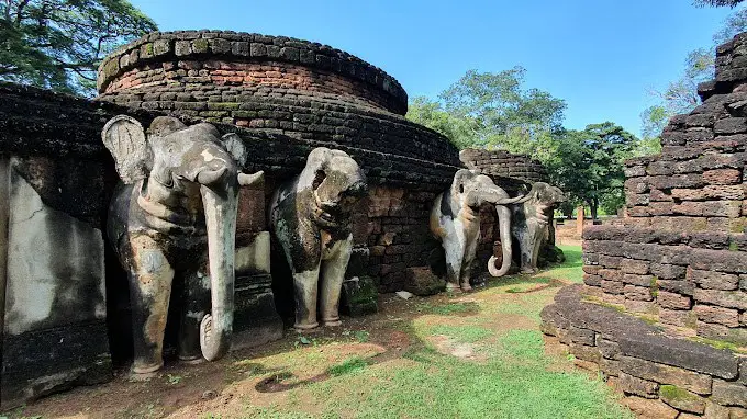 The elephant sculptures that line Wat Chang Phueak