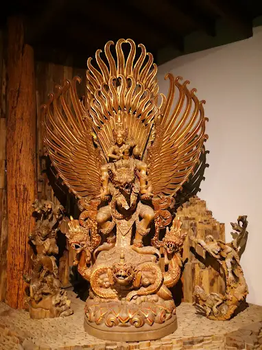 Intricate wood carvings at Woodland Museum & Resort
